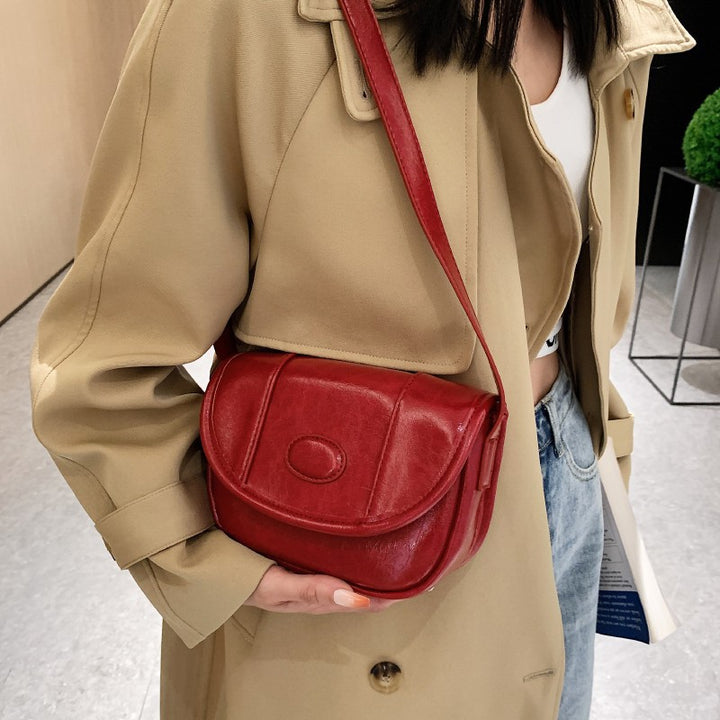 Damen Umhängetasche aus hochwertigem Kunstleder mit klassischer Klappenöffnung Nord Taschen