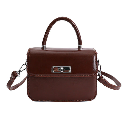 Damen Handtasche mit elegantem Kettenverschluss und abnehmbarem Schulterriemen Nord Taschen