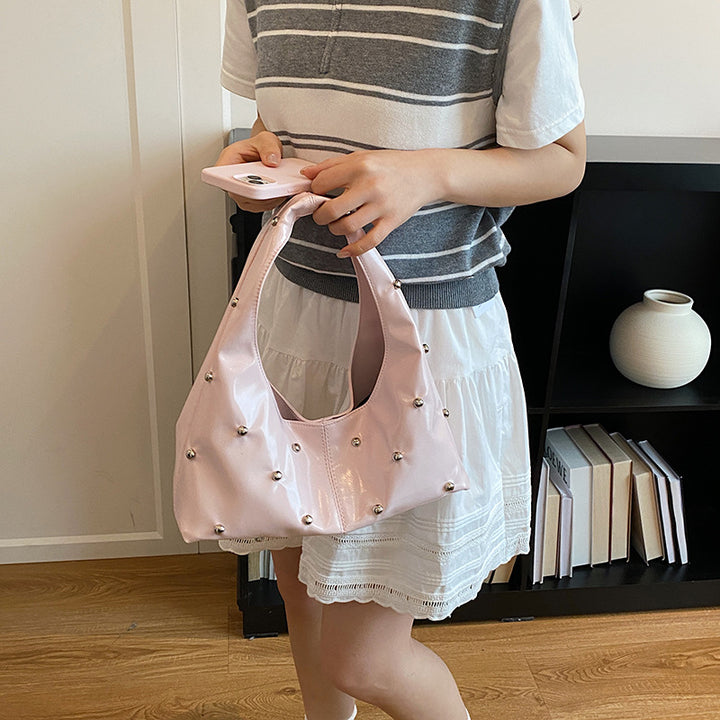 Damen glänzende Handtasche mit strukturiertem Design Nord Taschen
