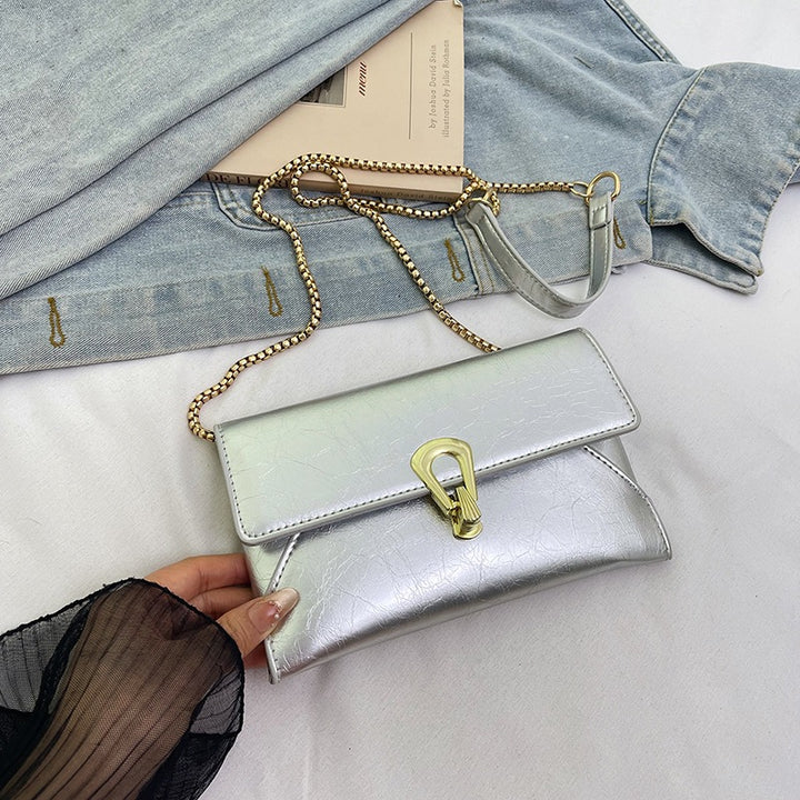 Damen elegante Handtasche im zeitlosen Design mit metallischen Akzenten Nord Taschen