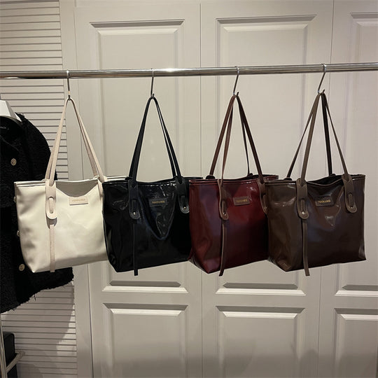 Damen elegante Ledereinkaufstasche mit schimmerndem Finish und abnehmbaren Schulterriemen Nord Taschen