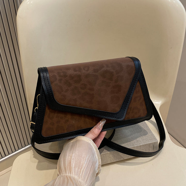 Damen Umhängetasche mit elegantem Leo-Design Nord Taschen