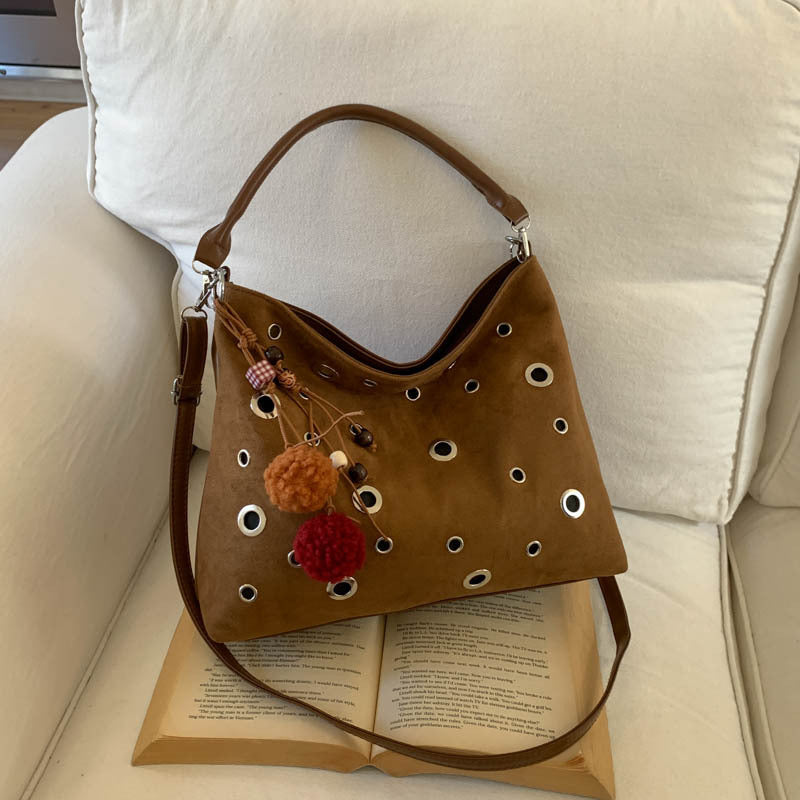 Damen modische Schultertasche mit einzigartiger Loch-Applikation Nord Taschen