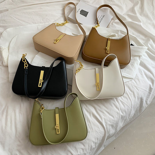 Damen Umhängetasche mit goldenen Akzenten und hochwertiger Oberfläche Nord Taschen