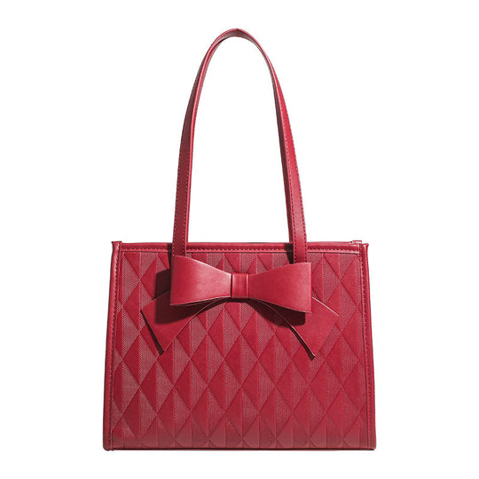 Damen Handtasche mit eleganter Diamantsteppung und dekorativem Schleifenakzent Nord Taschen
