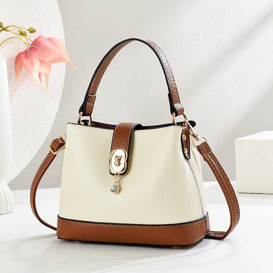 Damen elegante Handtasche mit goldenen Akzenten und abnehmbarem Schulterriemen Nord Taschen