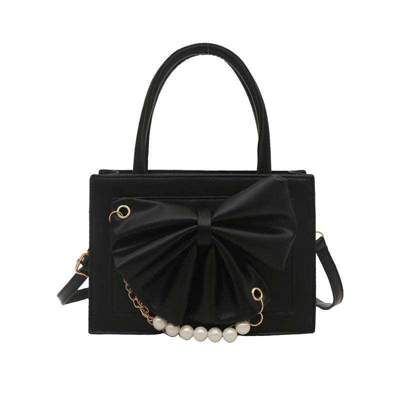Damen elegante Handtasche mit Schleifenakzent und Perlenverzierung Nord Taschen