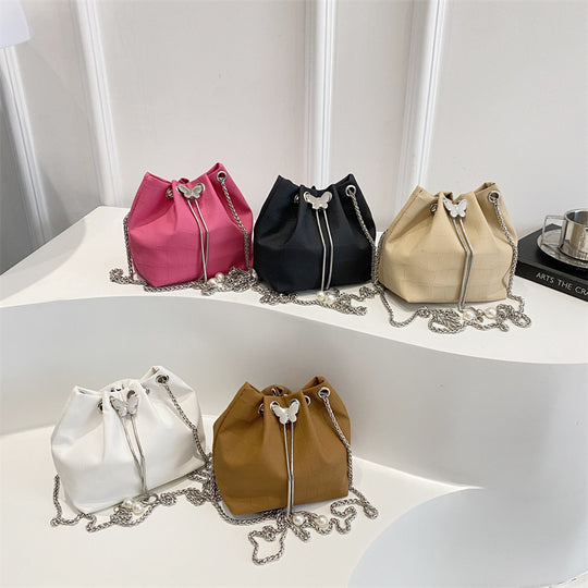 Damen Handtasche mit elegantem Kordelzug und detaillierter Schlangenprägung Nord Taschen
