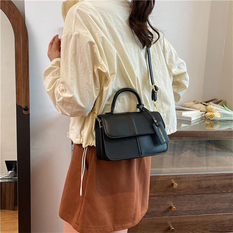 Damen elegante Handtasche mit strukturierten Details Nord Taschen
