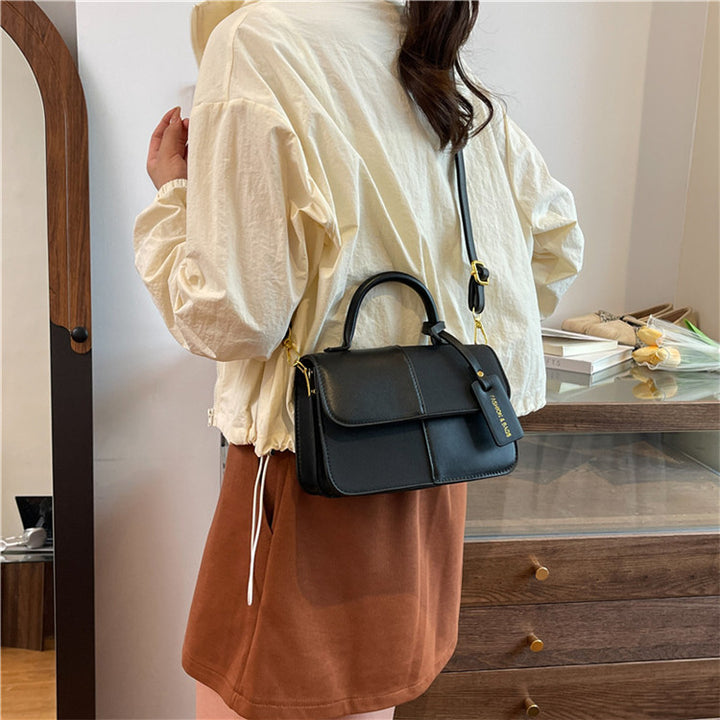 Damen elegante Handtasche mit strukturierten Details Nord Taschen