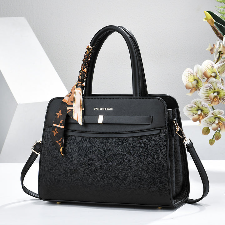 Damen elegante Handtasche mit praktischen Fächern und verspieltem Schal Nord Taschen