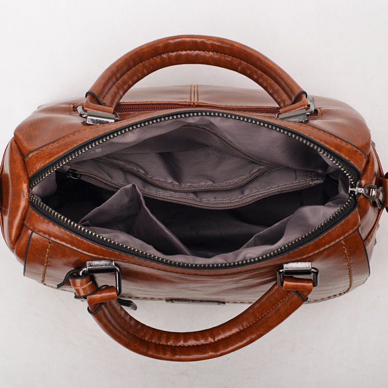 Damen Handtasche mit modischen Nieten und praktischem Schultergurt Nord Taschen