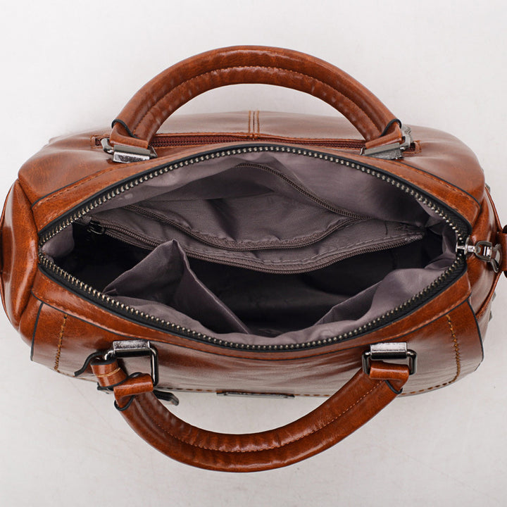 Damen Handtasche mit modischen Nieten und praktischem Schultergurt Nord Taschen
