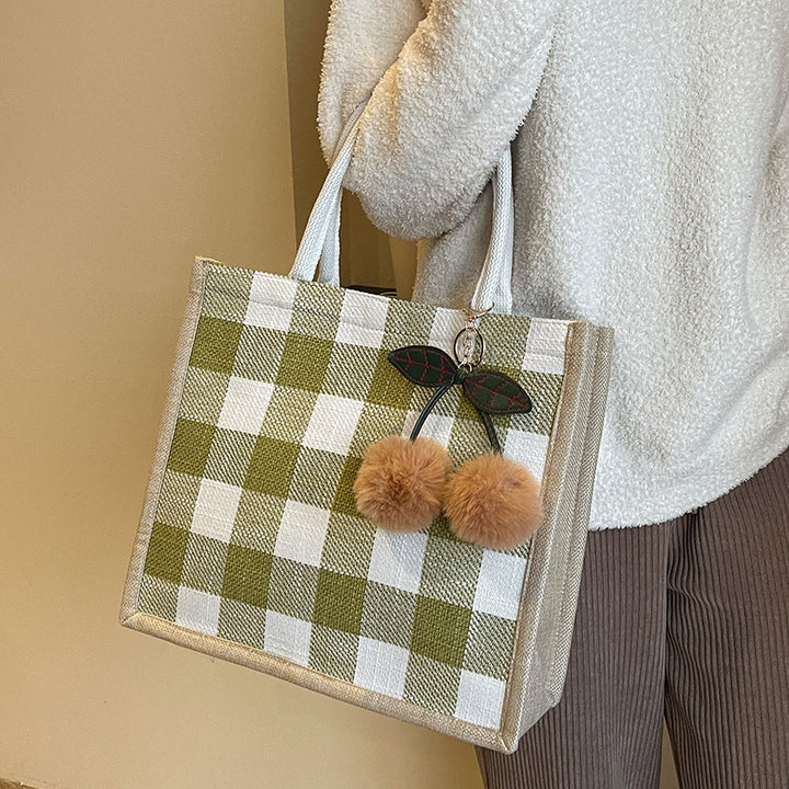 Damen Shopper-Tasche mit kariertem Design und verspielten Pompons Nord Taschen