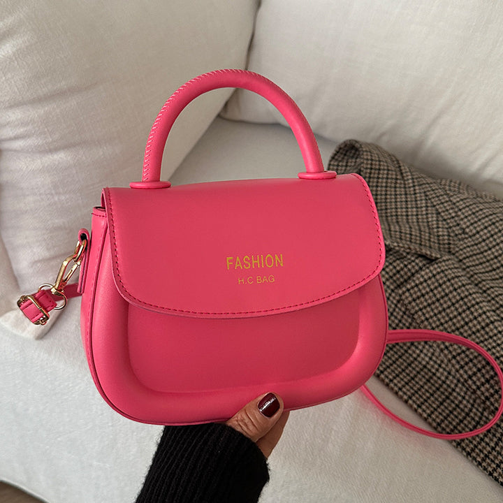 Damen Henkeltasche mit modernem Klappverschluss und eleganten Details Nord Taschen