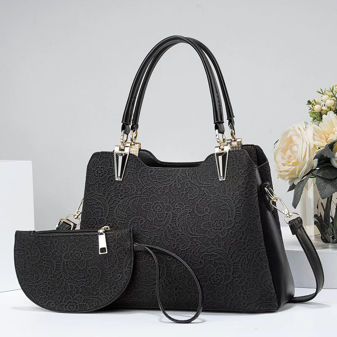 Damen elegante Handtasche mit filigranem Spitzenmuster und abnehmbarer Clutch Nord Taschen