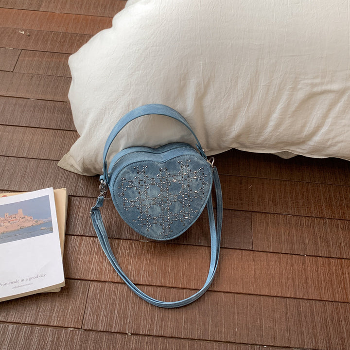 Damen herzförmige Umhängetasche aus Denim mit eleganten Perlendetails Nord Taschen