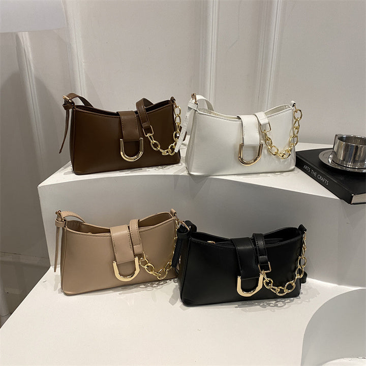 Damen Umhängetasche mit modischem Kettenverschluss und strukturiertem Design Nord Taschen