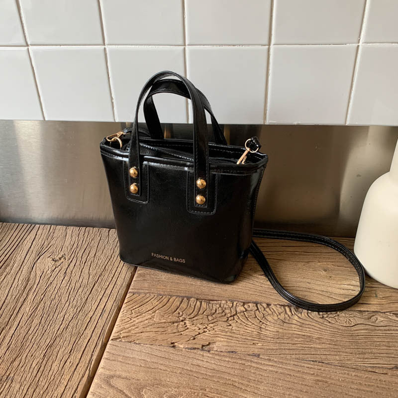 Damen Mini-Handtasche mit elegantem Tragegriff und praktischem Innenfach Nord Taschen