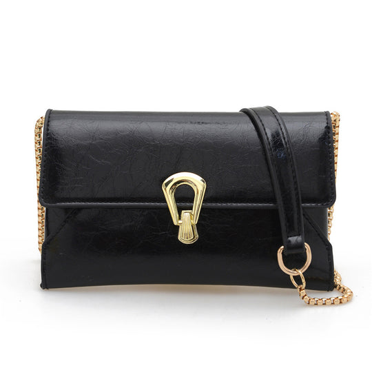 Damen elegante Handtasche im zeitlosen Design mit metallischen Akzenten Nord Taschen