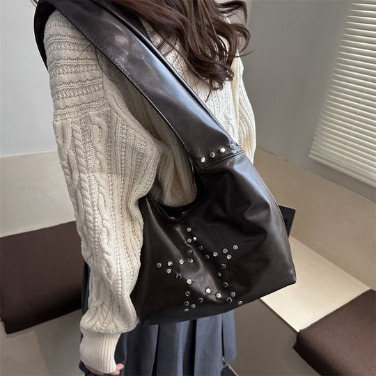 Damen Hobo-Tasche mit eleganter Sternenverzierung und strukturiertem Kunstleder Nord Taschen