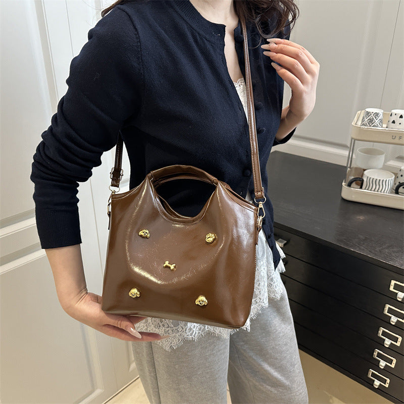 Damen Modische Handtasche mit goldenen Details Nord Taschen
