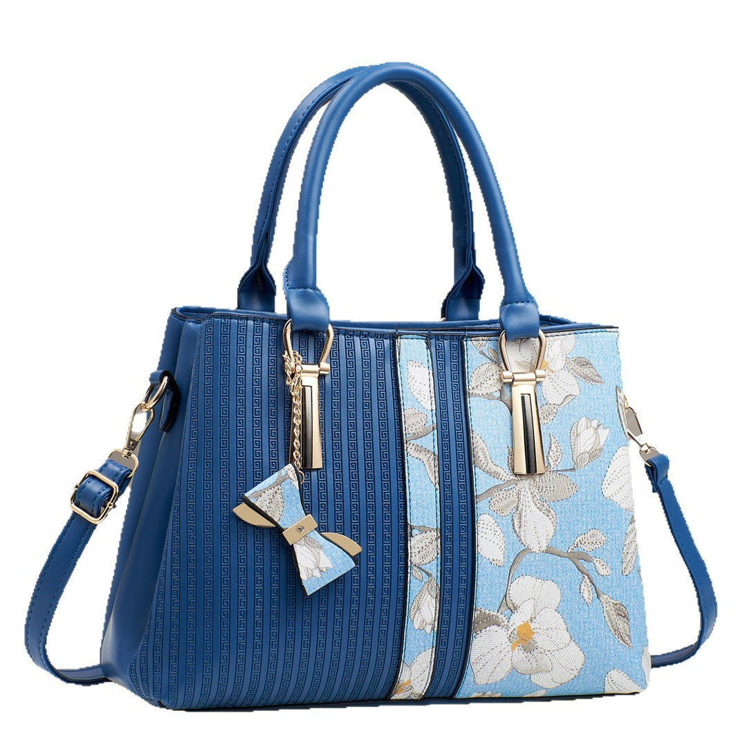 Damen elegante Handtasche mit floralen Akzenten Nord Taschen