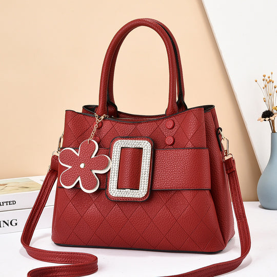 Damen Designer Handtasche mit besonderen Verzierungen und praktischem Schultergurt Nord Taschen