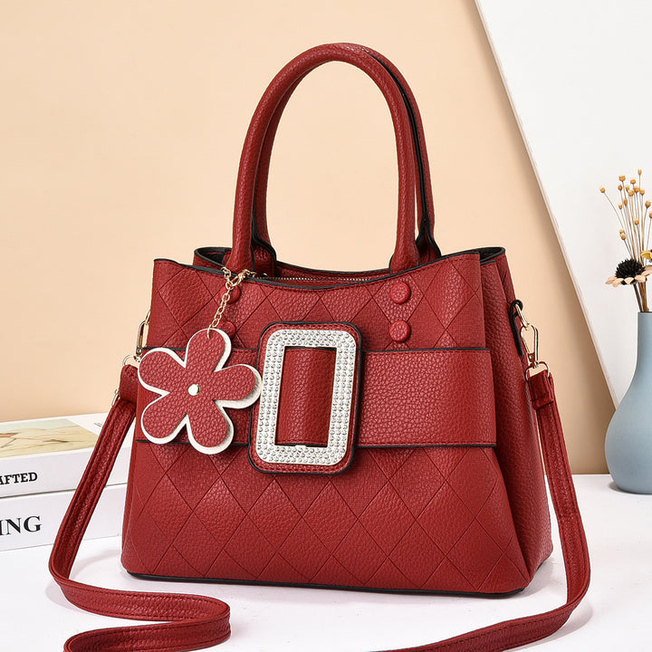 Damen Designer Handtasche mit besonderen Verzierungen und praktischem Schultergurt Nord Taschen