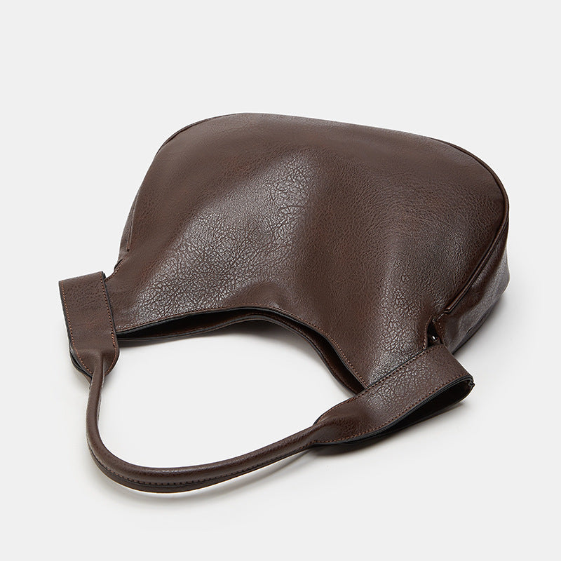 Damen Hobo-Tasche aus hochwertigem Kunstleder mit eleganter Oberflächenstruktur Nord Taschen