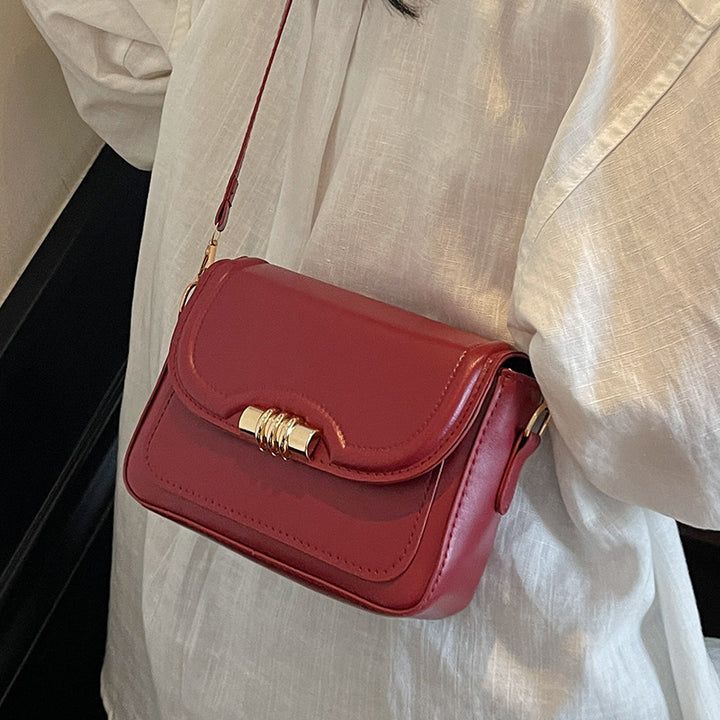 Damen elegante Umhängetasche mit strukturiertem Design und goldfarbenem Verschluss Nord Taschen