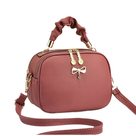 Damen Handtasche mit geflochtenem Tragegriff und edlem Zipper Nord Taschen