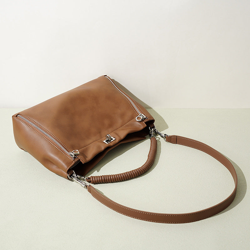 Damen elegante Lederhandtasche mit strukturierten Akzenten Nord Taschen