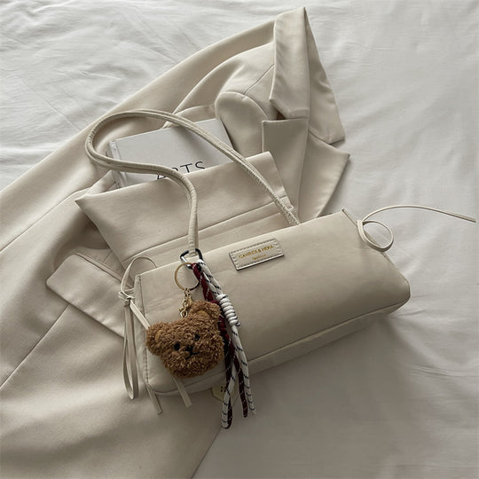 Damen elegante Clutch-Tasche mit verspieltem Anhänger Nord Taschen