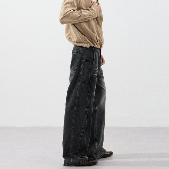 Herren Extraweite Skulpturale Denim‑Palazzohose mit Kniefalten und Teilungsnähten Nord Taschen