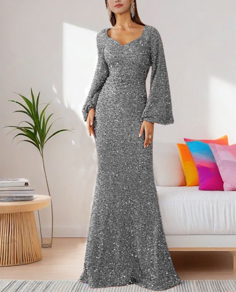 Damen Glamouröses Glitzer-Abendkleid mit schwingendem Rock und voluminösen Ärmeln