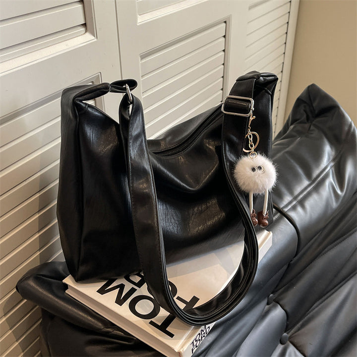 Damen Handtasche mit verspieltem Schlüsselanhänger Nord Taschen