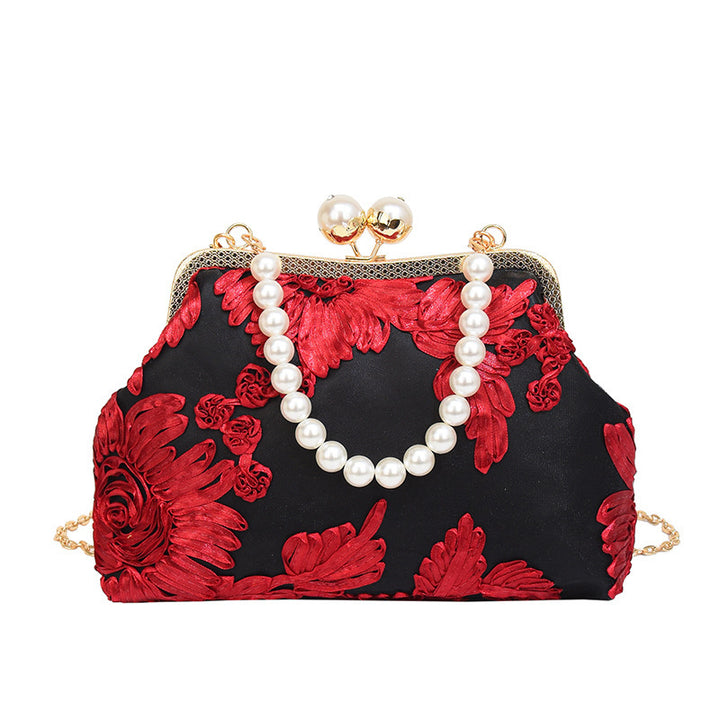 Damen elegante Clutch mit floralen Stickereien und Perlenakzenten Nord Taschen