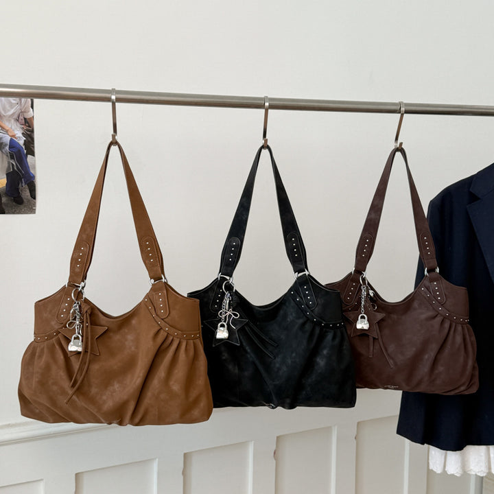 Damen Tasche mit raffiniertem Rüschendesign und Akzenten aus Metall von Nord Taschen