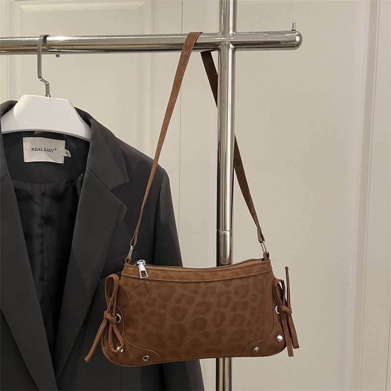 Damen Umhängetasche mit Leopardenmuster und dekorativen Schleifendetails Nord Taschen