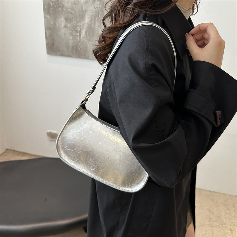 Damen elegante Umhängetasche aus veganem Leder mit minimalistischer Form Nord Taschen