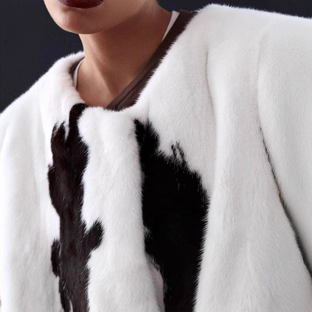 Damen Kurzmantel aus Kunstpelz mit kastiger Silhouette und Kuhfleckenmuster Nord Taschen