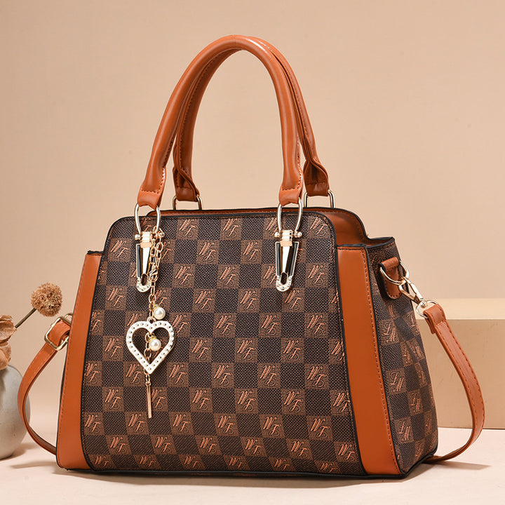 Damen Handtasche mit luxuriösem Mustermix und abnehmbarem Anhänger Nord Taschen