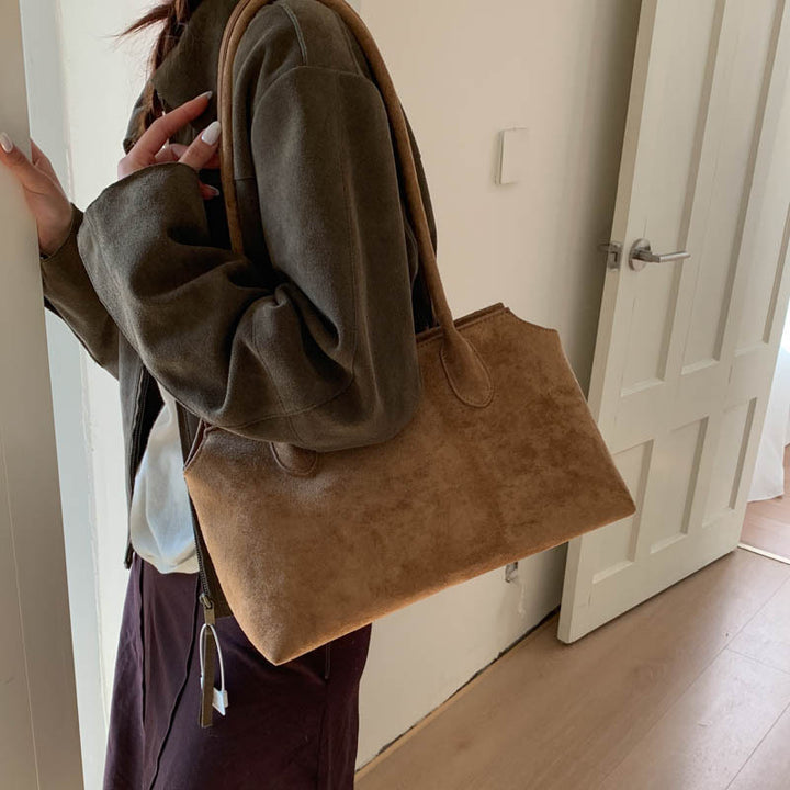 Damen elegante Handtasche aus weichem Kunstleder Nord Taschen