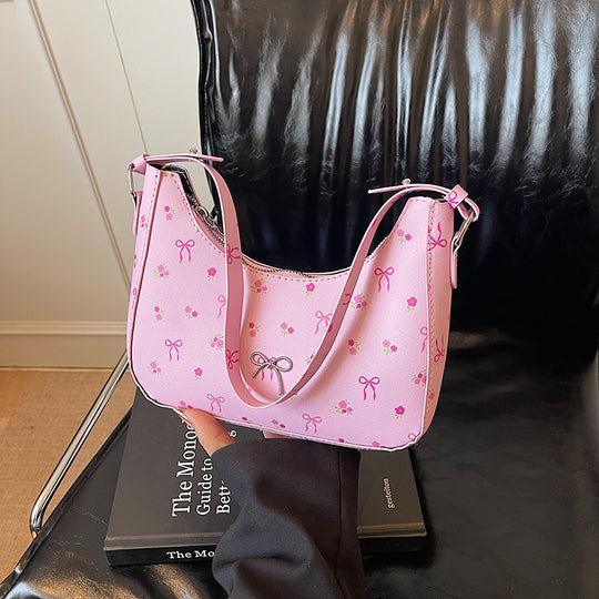 Damen Umhängetasche mit floralen Applikationen und verspieltem Schleifenverschluss Nord Taschen