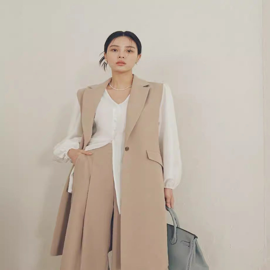 Damen Ärmellose Longweste im Tailoring mit Pattentaschen und einreihiger Knopfleiste Nord Taschen