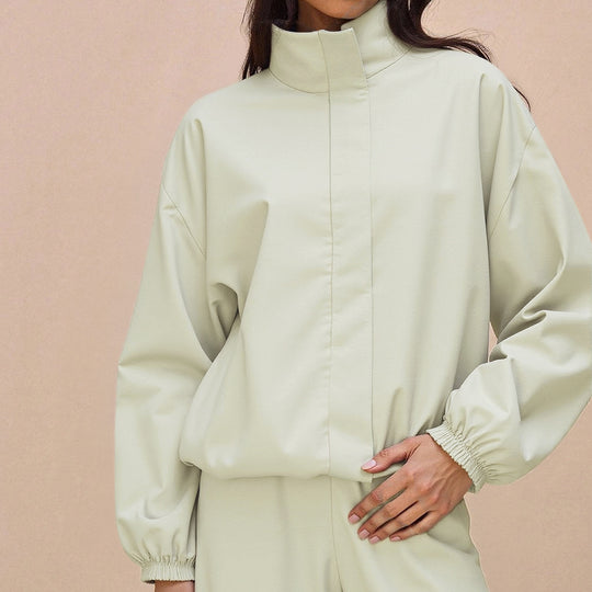 Damen Oversize-Trainingsset mit Stehkragen Ballonärmeln und weiten Kordelhosen Nord Taschen