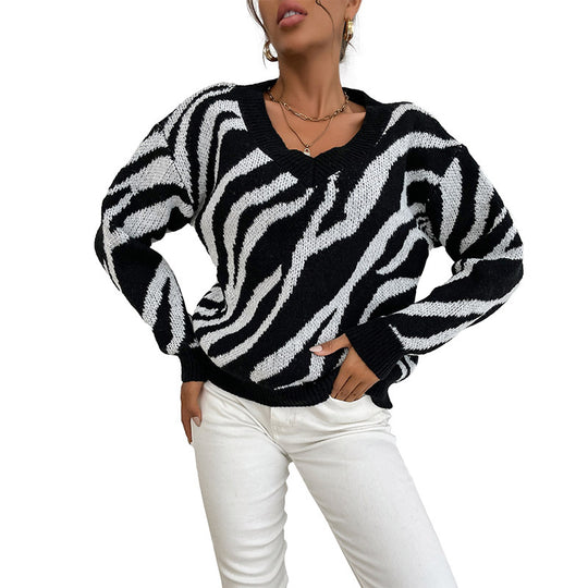Damen Oversize V-Ausschnitt Pullover mit Zebra-Jacquard und gerippten Bündchen Nord Taschen