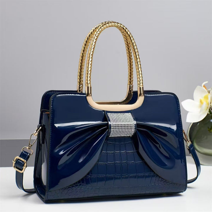 Damen Designer-Handtasche mit schimmerndem Schleifenakzent Nord Taschen
