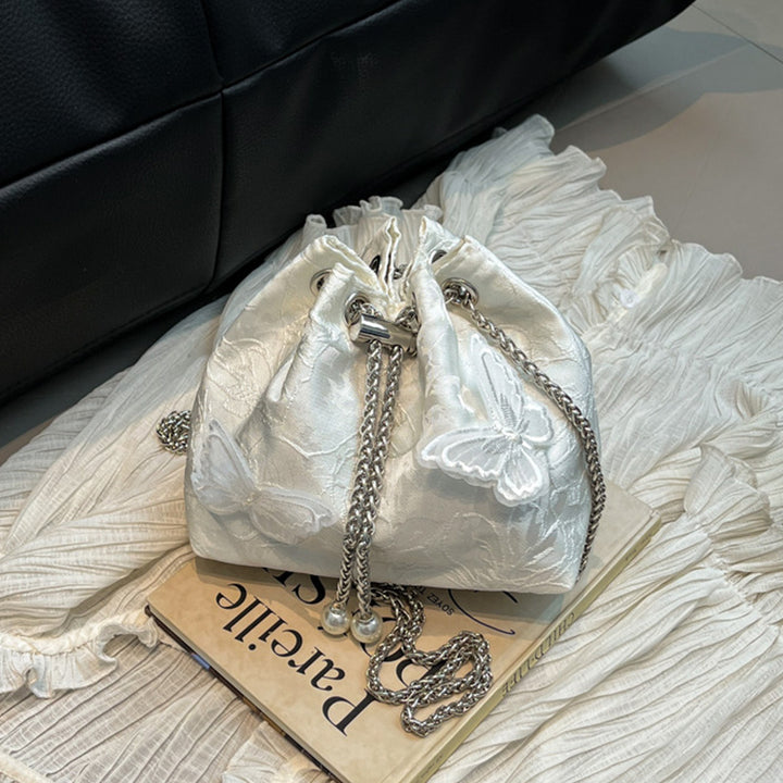 Damen Beuteltasche mit verspieltem Schmetterlingsdesign und eleganten Kettenakzenten Nord Taschen